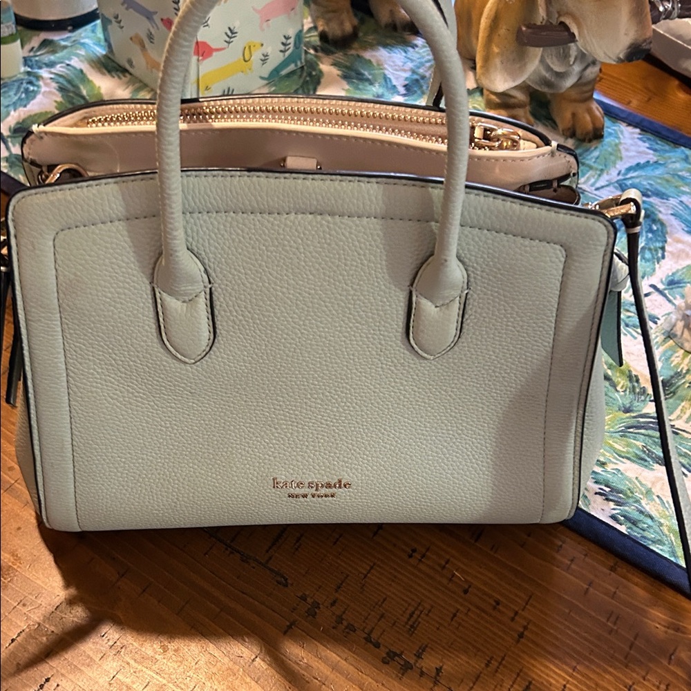 Kate Spade Light blueish light green.